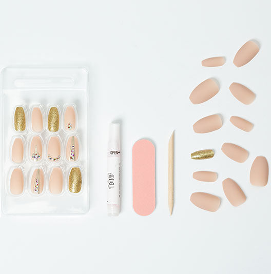 laid down separately a complete set with tools of Ardell Nail Addict Artificial Nail -Nude Jeweled variant